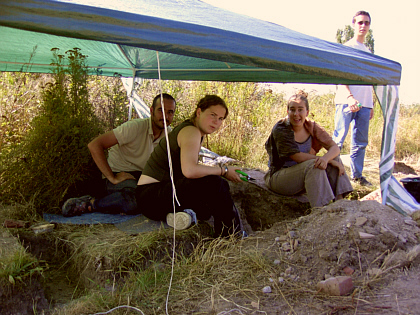 Augusto, Marlen and Corine under the tend with Fabio looking on
